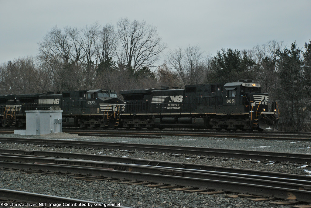 An older NS standard cab takes a train east.